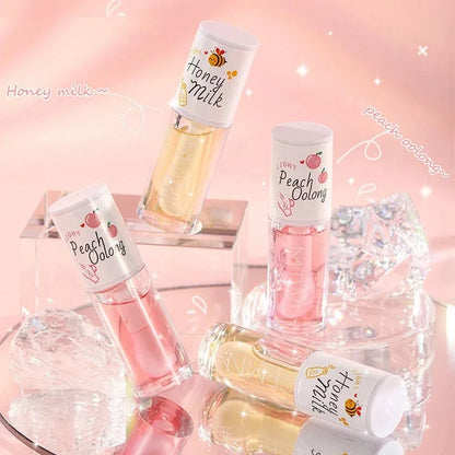 White Peach And Honey Lip Oil Soothes Dry Moisturizes And Does Not Fade Lovely Big Brush Head Lip Gloss