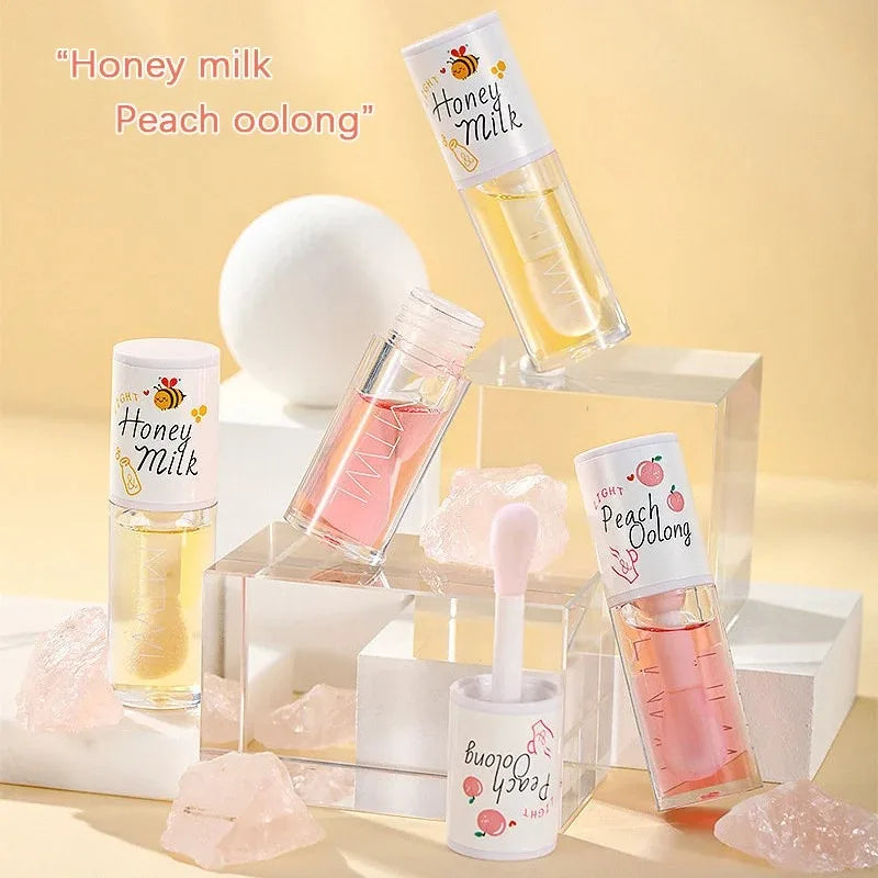 White Peach And Honey Lip Oil Soothes Dry Moisturizes And Does Not Fade Lovely Big Brush Head Lip Gloss