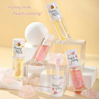 White Peach And Honey Lip Oil Soothes Dry Moisturizes And Does Not Fade Lovely Big Brush Head Lip Gloss