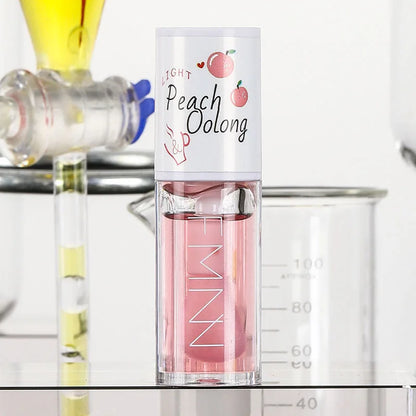 White Peach And Honey Lip Oil Soothes Dry Moisturizes And Does Not Fade Lovely Big Brush Head Lip Gloss