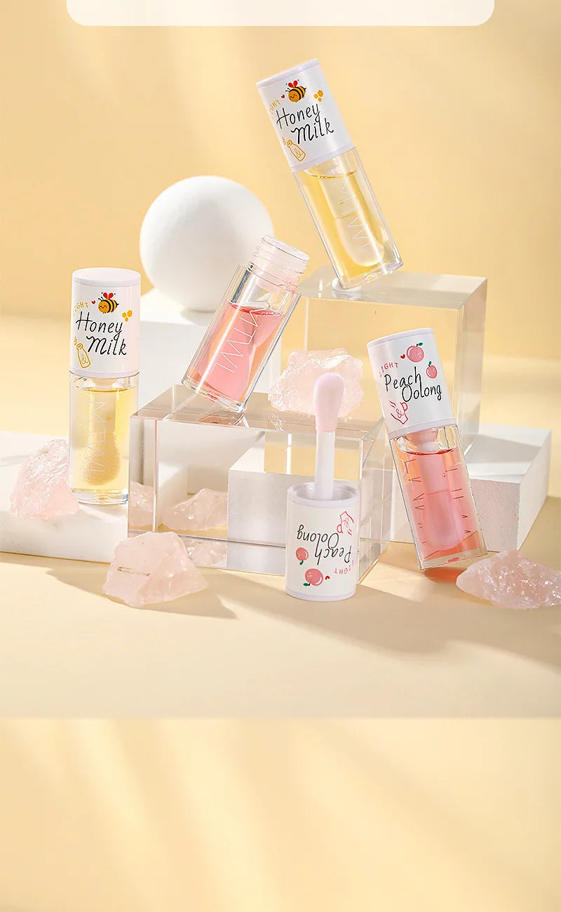 White Peach And Honey Lip Oil Soothes Dry Moisturizes And Does Not Fade Lovely Big Brush Head Lip Gloss