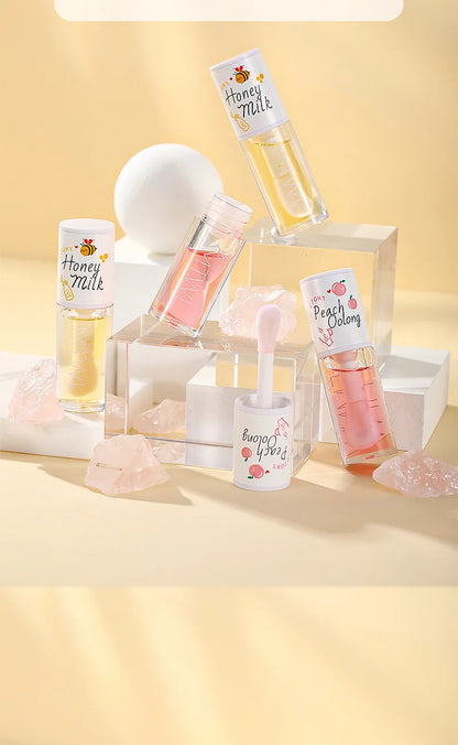 White Peach And Honey Lip Oil Soothes Dry Moisturizes And Does Not Fade Lovely Big Brush Head Lip Gloss